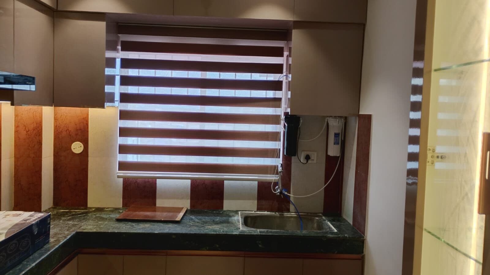 Zebra blind in a kitchen