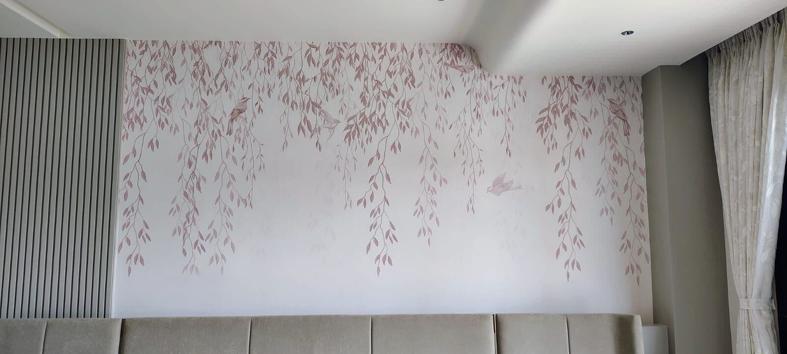Blossom mural behind the bed