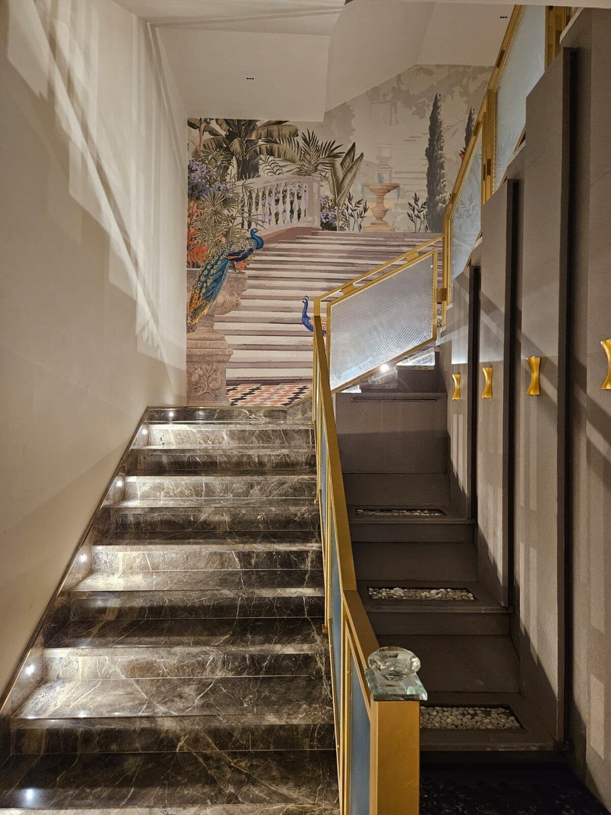 Garden mural along a staircase